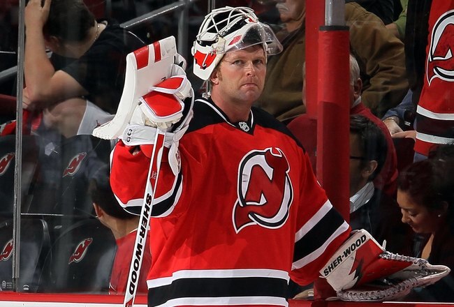 NEWARK, NJ - APRIL 22:  Martin Brodeur #30 of the New Jersey Devils defends against the Philadelphia Flyers in Game 5 of the Eastern Conference Quarterfinals during the 2010 NHL Stanley Cup Playoffs at the Prudential Center at on April 22, 2010 in Newark, New Jersey.  (Photo by Jim McIsaac/Getty Images)
