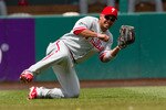 ST. LOUIS - JULY 22: Shane Victorino #8 of the Philadelphia Phillies makes a catch against the St. Louis Cardinals at Busch Stadium on July 22, 2010 in St. Louis, Missouri. The Phillies defeated the Cardinals 2-0.  (Photo by Dilip Vishwanat/Getty Images)