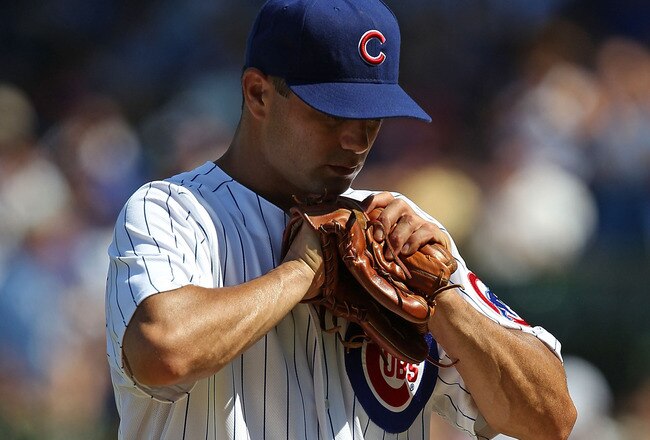 CHICAGO - JULY 21: Starting pitcher Ted Lilly #30 of the Chicago Cubs reacts as he leaves a game against the Houston Astros in the 8th inning at Wrigley Field on July 21, 2010 in Chicago, Illinois. The Astros defeated the Cubs 4-3 in 12 innings. (Photo by Jonathan Daniel/Getty Images)