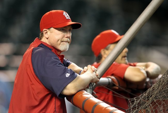 PHOENIX - JUNE 11:  Batting coach Mark McGwire #25 of the St. Louis Cardinals before the Major League Baseball game against the Arizona Diamondbacks at Chase Field on June 11, 2010 in Phoenix, Arizona. The Cardinals defeated the Diamondbacks 5-2.  (Photo by Christian Petersen/Getty Images)