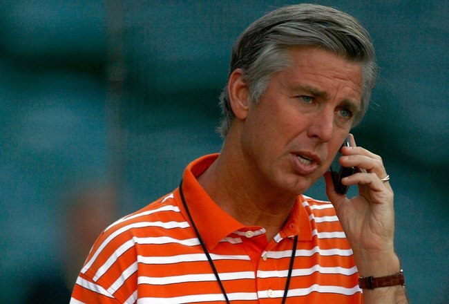 ANAHEIM, CA - APRIL 21:  Detroit Tigers general manager David Dombrowski talks on a cell phone during batting practice prior to the game against the Los Angeles Angels of Anaheim at Angel Stadium on April 21, 2009 in Anaheim, California.  (Photo by Jeff Gross/Getty Images)