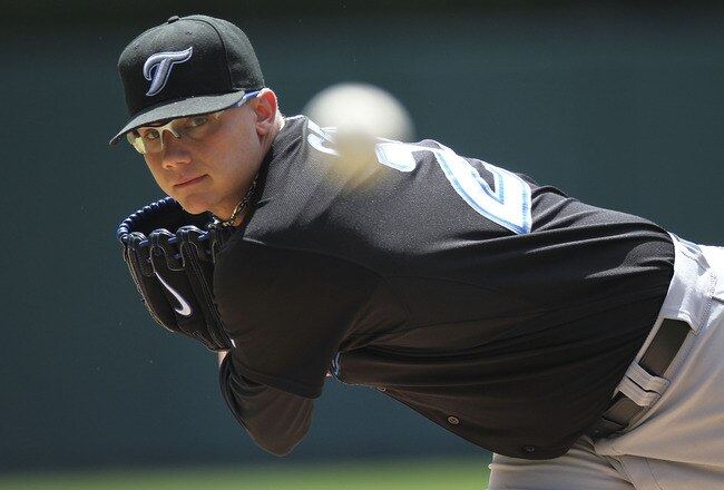 DETROIT - JULY 25: Brett Cecil #27 of the Toronto Blue Jays warms up prior to the start of the game aginst the Detroit Tigers on July 25, 2010 at Comerica Park in Detroit, Michigan. The Blue Jays defeated the Tigers 5-3. (Photo by Leon Halip/Getty Images)