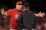 ANAHEIM, CA - JULY 01:  Los Angeles Angels of Anaheim manager Mike Scioscia argues a call with second base umpire Bruce Dreckman in the eighth inning against the Texas Rangers at Anaheim Stadium on July 1, 2010 in Anaheim, California. The Angels defeated the Rangers 2-1.  (Photo by Jeff Gross/Getty Images)