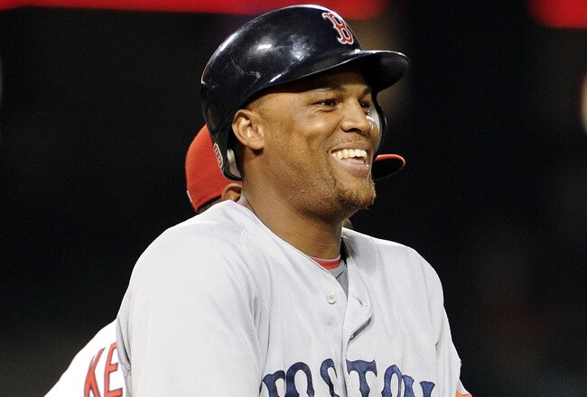 ANAHEIM, CA - JULY 26:  Adrian Beltre #29 of the Boston Red Sox reacts after being hit by a pitch immediately following the homerun run at bat by David Ortiz #34 against the Los Angeles Angels during the eighth inning at Angel Stadium on July 26, 2010 in Anaheim, California.  (Photo by Harry How/Getty Images)