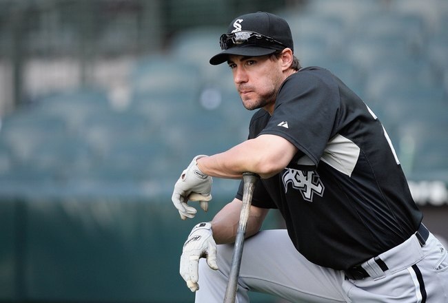 SEATTLE - AUGUST 12:  Scott Podsednik #22 of the Chicago White Sox looks on during batting practice prior to the game against the Seattle Mariners on August 12, 2009 at Safeco Field in Seattle, Washington. (Photo by Otto Greule Jr/Getty Images)