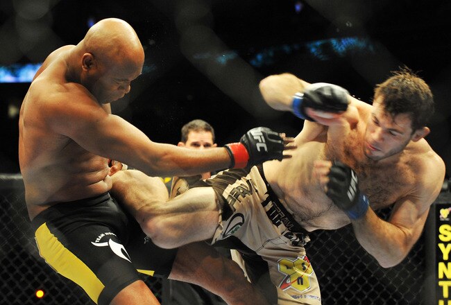 PHILADELPHIA - AUGUST 08:  (L-R) Anderson Silva battles  Forrest Griffin during their light heavyweight bout at UFC 101: Declaration at the Wachovia Center on August 8, 2009 in Philadelphia, Pennsylvania.  (Photo by Jon Kopaloff/Getty Images)