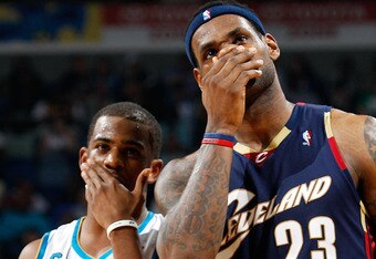 NEW ORLEANS - MARCH 24:  LeBron James #23 of the Cleveland Cavaliers talks with Chris Paul #3 of the New Orleans Hornets at the New Orleans Arena on March 24, 2010 in New Orleans, Louisiana.  The Cavaliers defeated the Hornets 105-92.  NOTE TO USER: User expressly acknowledges and agrees that, by downloading and/or using this Photograph, User is consenting to the terms and conditions of the Getty Images License Agreement.  v  (Photo by Chris Graythen/Getty Images)