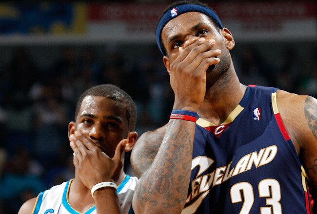 NEW ORLEANS - MARCH 24:  LeBron James #23 of the Cleveland Cavaliers talks with Chris Paul #3 of the New Orleans Hornets at the New Orleans Arena on March 24, 2010 in New Orleans, Louisiana.  The Cavaliers defeated the Hornets 105-92.  NOTE TO USER: User expressly acknowledges and agrees that, by downloading and/or using this Photograph, User is consenting to the terms and conditions of the Getty Images License Agreement.  v  (Photo by Chris Graythen/Getty Images)