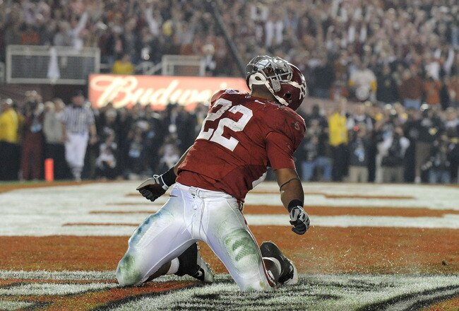 PASADENA, CA - JANUARY 07:  Running back Mark Ingram #22 of the Alabama Crimson Tide celebrates after scoring in the fourth quarter against the Texas Longhorns during the Citi BCS National Championship game at the Rose Bowl on January 7, 2010 in Pasadena, California.  (Photo by Harry How/Getty Images)