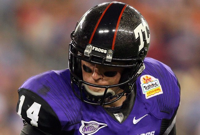 GLENDALE, AZ - JANUARY 04:  Quarterback Andy Dalton #14 of the TCU Horned Frogs runs the ball against the Boise State Broncos during the Tostitos Fiesta Bowl at the Universtity of Phoenix Stadium on January 4, 2010 in Glendale, Arizona.  (Photo by Christian Petersen/Getty Images)