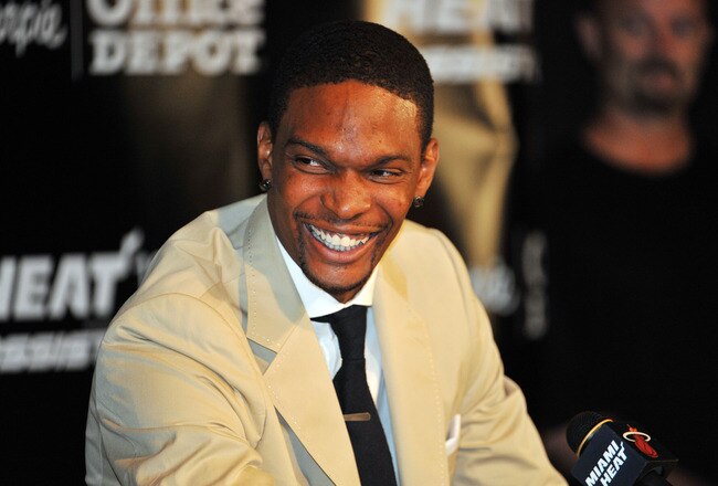 MIAMI - JULY 09:  Chris Bosh #1 of the Miami Heat talks during a press conference after a welcome party at American Airlines Arena on July 9, 2010 in Miami, Florida.  (Photo by Doug Benc/Getty Images)