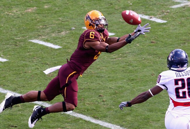 TEMPE, AZ - NOVEMBER 28:  Wide receiver Kyle Williams #6 of the Arizona State Sun Devils makes a diving 44 yard reception past Cam Nelson #20 of the Arizona Wildcats during the first quarter of the college football game at Sun Devil Stadium on November 28, 2009 in Tempe, Arizona.  (Photo by Christian Petersen/Getty Images)