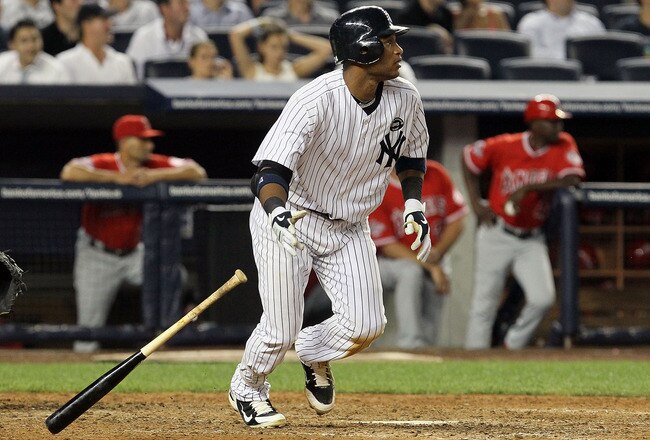NEW YORK - JULY 20:  Robinson Cano #24 of the New York Yankees bats against the Los Angeles Angels of Anaheim on July 20, 2010 at Yankee Stadium in the Bronx borough of New York City. The Angels defeated the Yankees 10-2.  (Photo by Jim McIsaac/Getty Images)