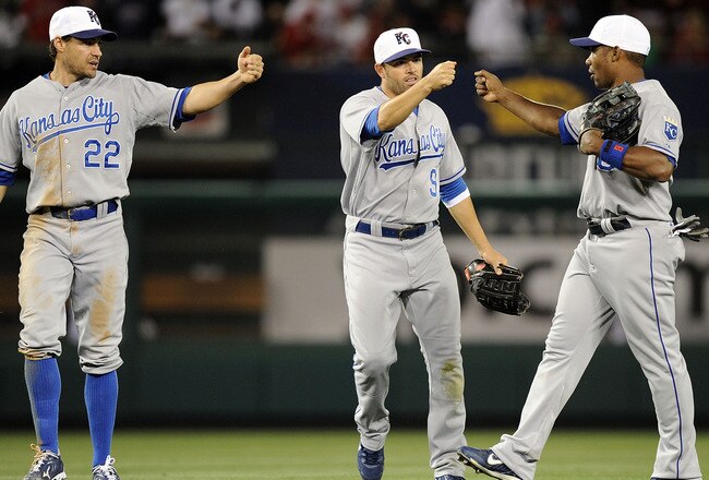 ANAHEIM, CA - JULY 02:  Jose Guillen #6, David DeJesus #9 and Scott Podsednik #22 of the Kansas City Royals celebrate a 2-1 victory over the Los Angeles Angels during the 10th inning at Angel Stadium on July 2, 2010 in Anaheim, California.  (Photo by Harry How/Getty Images)