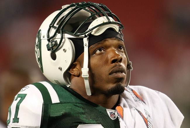 EAST RUTHERFORD, NJ - AUGUST 14: Calvin Pace #97 of the New York Jets walks off the field against the St. Louis Rams during their preseason game at Giants Stadium on August 14, 2009  in East Rutherford, New Jersey.  (Photo by Nick Laham/Getty Images)