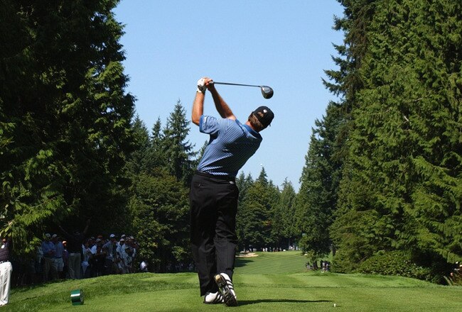SAMMAMISH, WA. - AUGUST 24:   Retief Goosen of South Africa hits a shot during the third round of the NEC Invitational on August 24, 2002 at Sahalee Country Club in Sammamish, Washington.  (Photo By Harry How/Getty Images)