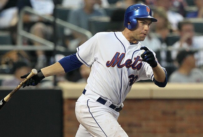 NEW YORK - JULY 07:  Josh Thole #30 of the New York Mets connects on a fifth inning base hit against the Cincinnati Reds on July 7, 2010 at Citi Field in the Flushing neighborhood of the Queens borough of New York City.  (Photo by Jim McIsaac/Getty Images)