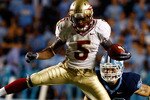 CHAPEL HILL, NC - OCTOBER 22:  Greg Reid #5 of the Florida State Seminoles leaps over North Carolina Tar Heels defenders Kennedy Tinsley #36 and Hunter Furr, #40 at Kenan Stadium on October 22, 2009 in Chapel Hill, North Carolina.  (Photo by Scott Halleran/Getty Images)