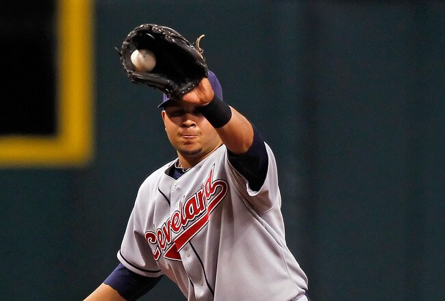 ST PETERSBURG, FL - MAY 17:  Infielder Jhonny Peralta #2 of the Cleveland Indians catches a line drive at third against the Tampa Bay Rays during the game at Tropicana Field on May 17, 2010 in St. Petersburg, Florida.  (Photo by J. Meric/Getty Images)