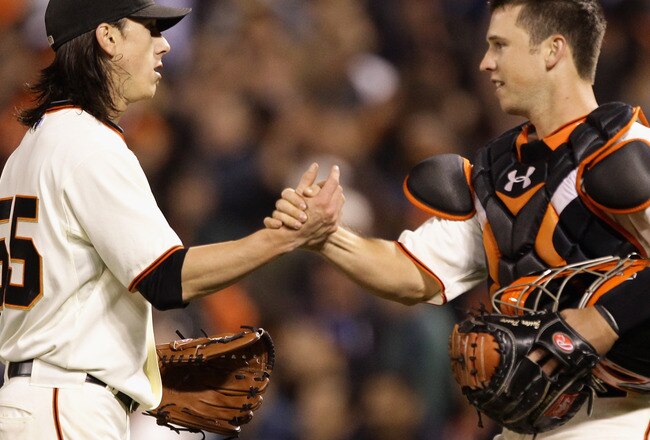 SAN FRANCISCO - JULY 15:  Tim Lincecum #55 of the San Francisco Giants is congratulated by Buster Posey #28 after Lincecum pitched a complete game shut out against the New York Mets at AT&T Park on July 15, 2010 in San Francisco, California.  (Photo by Ezra Shaw/Getty Images)