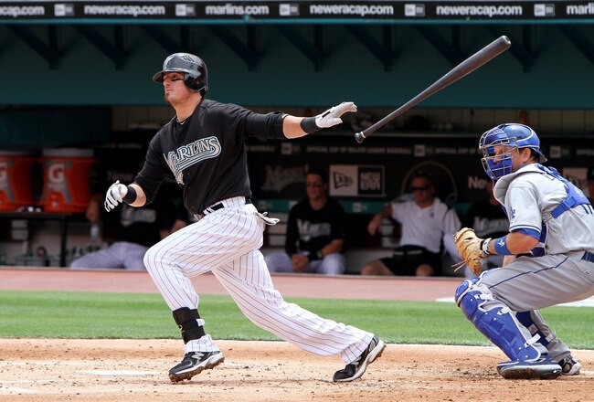 MIAMI - APRIL 11:  Third baseman Jorge Cantu #3 of the Florida Marlins follows through against the Los Angeles Dodgers at Sun Life Stadium on April 11, 2010 in Miami, Florida. The Marlins defeated the Dodgers 6-5.  (Photo by Doug Benc/Getty Images)