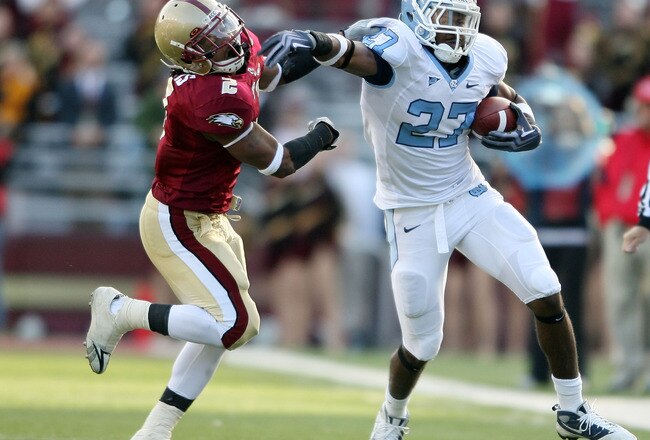 CHESTNUT HILL, MA - NOVEMBER 21:  Deunta Williams #27 of the North Carolina Tar Heels carries the ball as Montel Harris #2 of the Boston College Eagles tries to make the stop on November 21, 2009 at Alumni Stadium in Chestnut Hill, Massachusetts. The Tar Heels defeated the Eagles 31-13. Williams intercepted a pass from Dave Shinskie of the Eagles. (Photo by Elsa/Getty Images)