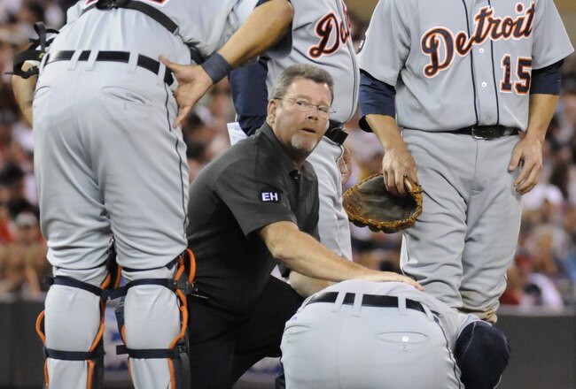 MINNEAPOLIS, MN - JUNE 28: Gerald Laird #12, manager Jim Leyland #10 and Brandon Inge #15 of the Detroit Tigers look on as Joel Zumaya #54 is looked at by a trainer in the eighth inning against the Minnesota Twins during their game on June 28, 2010 at Target Field in Minneapolis, Minnesota. Tigers defeated the Twins 7-5. (Photo by Hannah Foslien /Getty Images)