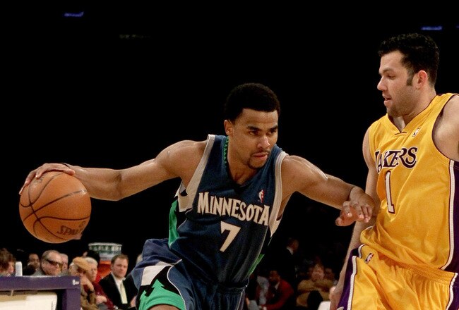 LOS ANGELES - MARCH 19:  Ramon Sessions #7 of the Minnesota Timberwolves drives around Jordan Farmar #1 of the Los Angeles Lakers on March 19, 2010 at Staples Center in Los Angeles, California.  The Lakeres won 104-96. NOTE TO USER: User expressly acknowledges and agrees that, by downloading and/or using this Photograph, user is consenting to the terms and conditions of the Getty Images License Agreement. (Photo by Stephen Dunn/Getty Images)