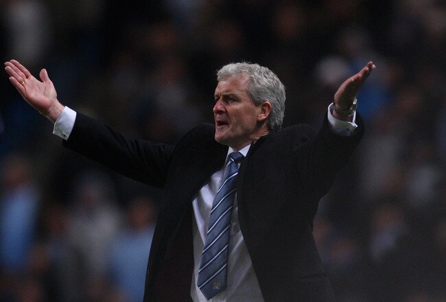 MANCHESTER, ENGLAND - DECEMBER 19:  Manchester City manager Mark Hughes reacts during the Barclays Premier League game between Manchester City and Sunderland at City of Manchester Stadium on December 19, 2009 in Manchester, England.  (Photo by Stu Forster/Getty Images)
