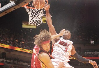 Wade-dunks-on-varejao_crop_340x234