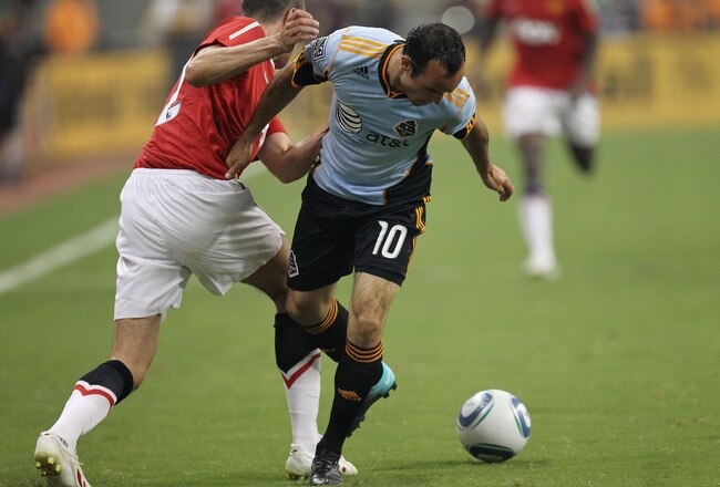 HOUSTON - JULY 28:  Landon Donovan #10 of the MLS All-Stars looks to control the ball against Manchester United during the MLS All Star Game at Reliant Stadium on July 28, 2010 in Houston, Texas.  (Photo by Ronald Martinez/Getty Images)