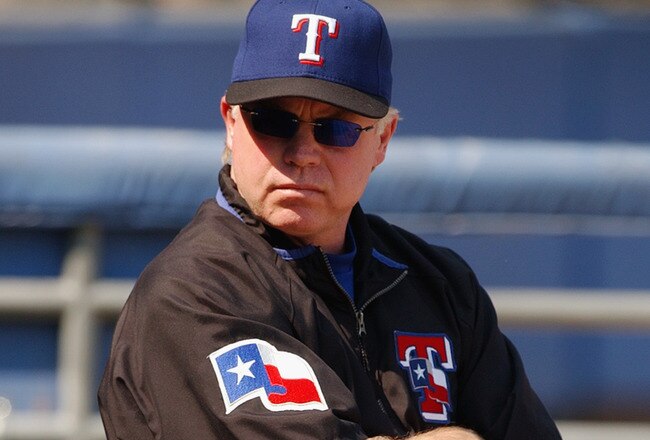 CHICAGO - AUGUST 24:  Manager Buck Showalter #11 of the Texas Rangers watches his team during the game against the Chicago White Sox on August 24, 2003 at U.S. Cellular Field in Chicago, Illinois. The Rangers defeated the White Sox 5-0. (Photo by Jonathan Daniel/Getty Images)