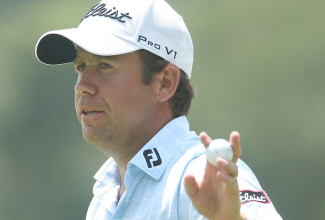 WHITE SULPHUR SPRINGS, WV - JULY 29:  Erik Compton waves to the gallery after a birdie putt on the 17th hole during the first round of the Greenbrier Classic on The Old White Course at the Greenbrier Resort on July 29, 2010 in White Sulphur Springs, West Virginia.  (Photo by Scott Halleran/Getty Images)
