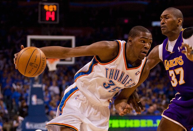 OKLAHOMA CITY - APRIL 30: Kevin Durant #35 of the Oklahoma City Thunder drives to the basket  against Ron Artest #37 of the Los Angeles Lakers during Game Six of the Western Conference Quarterfinals of the 2010 NBA Playoffs on April 30, 2010 at the Ford Center in Oklahoma City, Oklahoma.  The Lakers beat the Thunder 95-94.  NOTE TO USER: User expressly acknowledges and agrees that, by downloading and or using this photograph, User is consenting to the terms and conditions of the Getty Images License Agreement.  (Photo by Dilip Vishwanat/Getty Images)