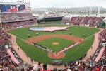 CINCINNATI, OH - APRIL 6:  Both teams line up during the National Anthem of the United States before the opening day game between the Cincinnati Reds against the New York Mets at Great American Ballpark on April 6, 2009 in Cincinnati, Ohio. (Photo by Mark Lyons/Getty Images)