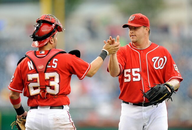 WASHINGTON - JULY 29:  Matt Capps #55 of the Washington Nationals celebrates with Wil Nieves #23 after a 5-3 victory against the Atlanta Braves at Nationals Park on July 29, 2010 in Washington, DC.  (Photo by Greg Fiume/Getty Images)