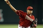 PHOENIX - JUNE 13:  Starting pitcher Edwin Jackson #36 of the Arizona Diamondbacks pitches against the St. Louis Cardinals during the Major League Baseball game at Chase Field on June 13, 2010 in Phoenix, Arizona. The Diamondbacks defeated the Cardinals 7-5.  (Photo by Christian Petersen/Getty Images)