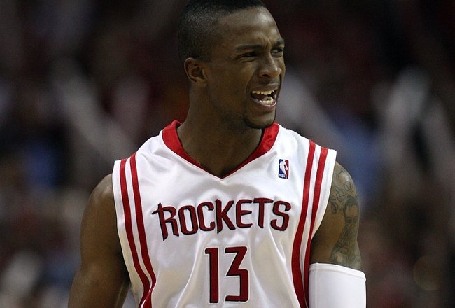 HOUSTON - APRIL 30:  Forward Von Wafer #13 of the Houston Rockets reacts in Game Six of the Western Conference Quarterfinals during the 2009 NBA Playoffs at Toyota Center on April 30, 2009 in Houston, Texas. NOTE TO USER: User expressly acknowledges and agrees that, by downloading and or using this photograph, User is consenting to the terms and conditions of the Getty Images License Agreement.  (Photo by Ronald Martinez/Getty Images)