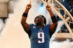 JACKSONVILLE, FL - DECEMBER 17:  David Garrard #9 of the Jacksonville Jaguars takes the field during player introductions against the Indianapolis Colts at Jacksonville Municipal Stadium on December 17, 2009 in Jacksonville, Florida.  (Photo by Sam Greenwood/Getty Images)