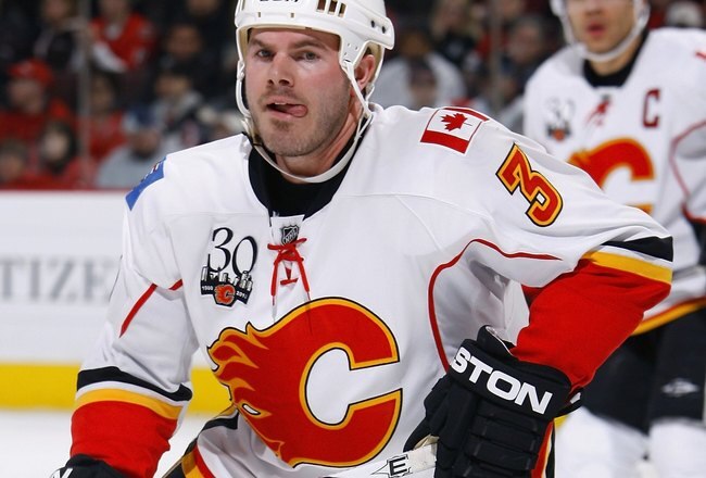 OTTAWA, ON - FEBRUARY 09:  Ian White #13 of the Calgary Flames skates during the NHL game against the Ottawa Senators at Scotiabank Place on February 9, 2010 in Ottawa, Canada.  (Photo by Phillip MacCallum/Getty Images)