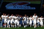TEMPE, AZ - DECEMBER 31:  The Minnesota Golden Gophers run out onto the field before the Insight Bowl against the Iowa State Cyclones at Arizona Stadium on December 31, 2009 in Tempe, Arizona.  (Photo by Christian Petersen/Getty Images)