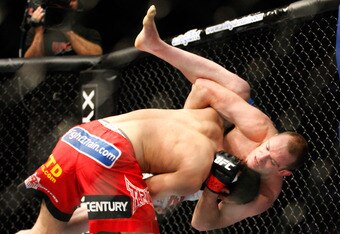 MONTREAL- MAY 8: Johny Hendricks holds on to TJ Grant in their welterweight bout at UFC 113 at Bell Centre on May 8, 2010 in Montreal, Quebec, Canada.  (Photo by Richard Wolowicz/Getty Images)