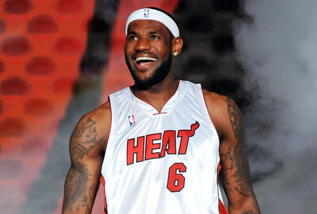 MIAMI - JULY 09:  LeBron James #6 of the Miami Heat greets fans as he is introduced during a welcome party at American Airlines Arena on July 9, 2010 in Miami, Florida.  (Photo by Doug Benc/Getty Images)