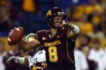 MINNEAPOLIS - SEPTEMBER 13:  Quarterback Adam Weber #8 of the Minnesota Golden Gophers drops back to pass against the Montana State Bobcats at the Metrodome on September 13, 2008 in Minneapolis, Minnesota.  (Photo by Jeff Gross/Getty Images)