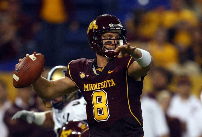 MINNEAPOLIS - SEPTEMBER 13:  Quarterback Adam Weber #8 of the Minnesota Golden Gophers drops back to pass against the Montana State Bobcats at the Metrodome on September 13, 2008 in Minneapolis, Minnesota.  (Photo by Jeff Gross/Getty Images)