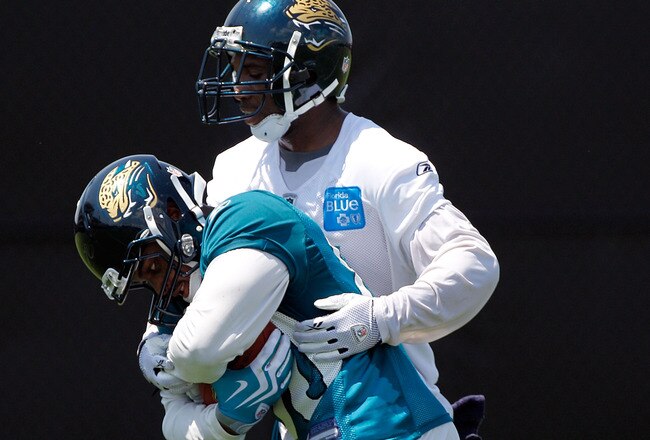 JACKSONVILLE, FL - JULY 30:  Mike Thomas #80 and Mike Sims -Walker #11 of the Jacksonville Jaguars during the first day of Training Camp at EverBank Field on July 30, 2010 in Jacksonville, Florida.  (Photo by Sam Greenwood/Getty Images)