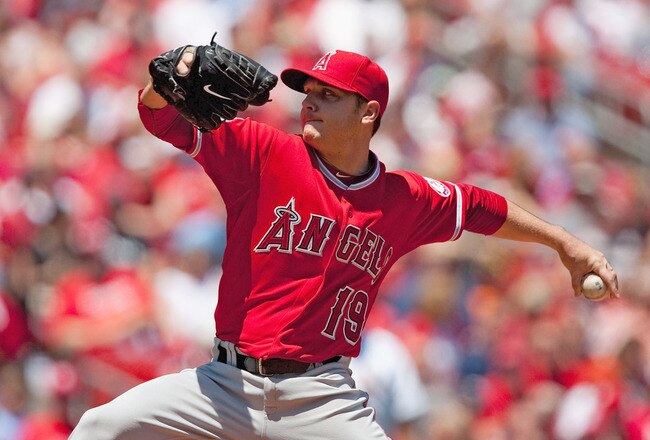 ST. LOUIS - MAY 22: Starting pitcher Scott Kazmir #19 of the Los Angeles Angels of Anaheim throws against the St. Louis Cardinals at Busch Stadium on May 22, 2010 in St. Louis, Missouri.  The Angels beat the Cardinals 10-7.  (Photo by Dilip Vishwanat/Getty Images)