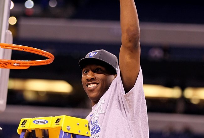 INDIANAPOLIS - APRIL 05:  Nolan Smith of the Duke Blue Devils celebrates after he cut down a piece of the net following their 61-59 win against the Butler Bulldogs during the 2010 NCAA Division I Men's Basketball National Championship game at Lucas Oil Stadium on April 5, 2010 in Indianapolis, Indiana.  (Photo by Andy Lyons/Getty Images)