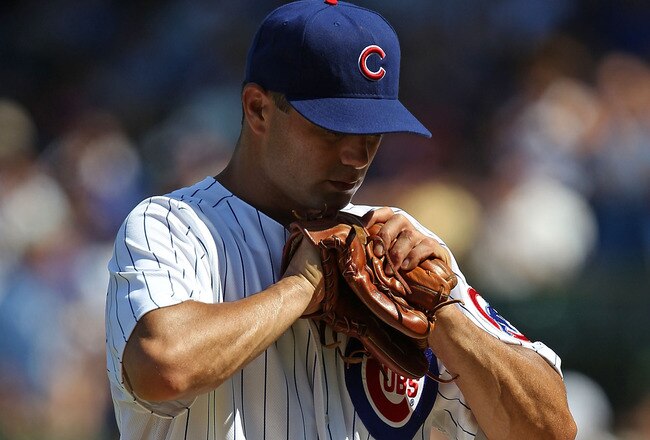 CHICAGO - JULY 21: Starting pitcher Ted Lilly #30 of the Chicago Cubs reacts as he leaves a game against the Houston Astros in the 8th inning at Wrigley Field on July 21, 2010 in Chicago, Illinois. The Astros defeated the Cubs 4-3 in 12 innings. (Photo by Jonathan Daniel/Getty Images)