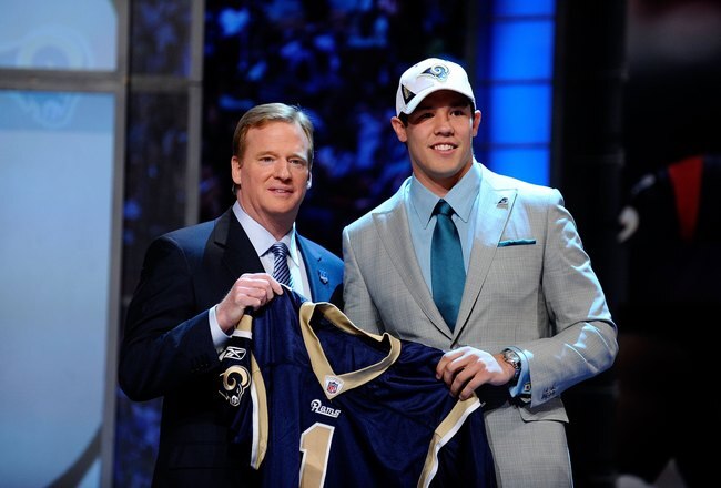 NEW YORK - APRIL 22:  Quarterback Sam Bradford (R) from the Oklahoma Sooners poses with NFL Commissioner Roger Goodell as they hold up a St. Louis Rams jersey after the Rams selected Bradford numer 1 overall during the first round of the 2010 NFL Draft at Radio City Music Hall on April 22, 2010 in New York City.  (Photo by Jeff Zelevansky/Getty Images)